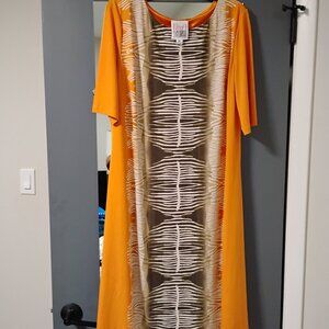 Beautiful, mustard and brown dress for all occasions, with a hint of cream